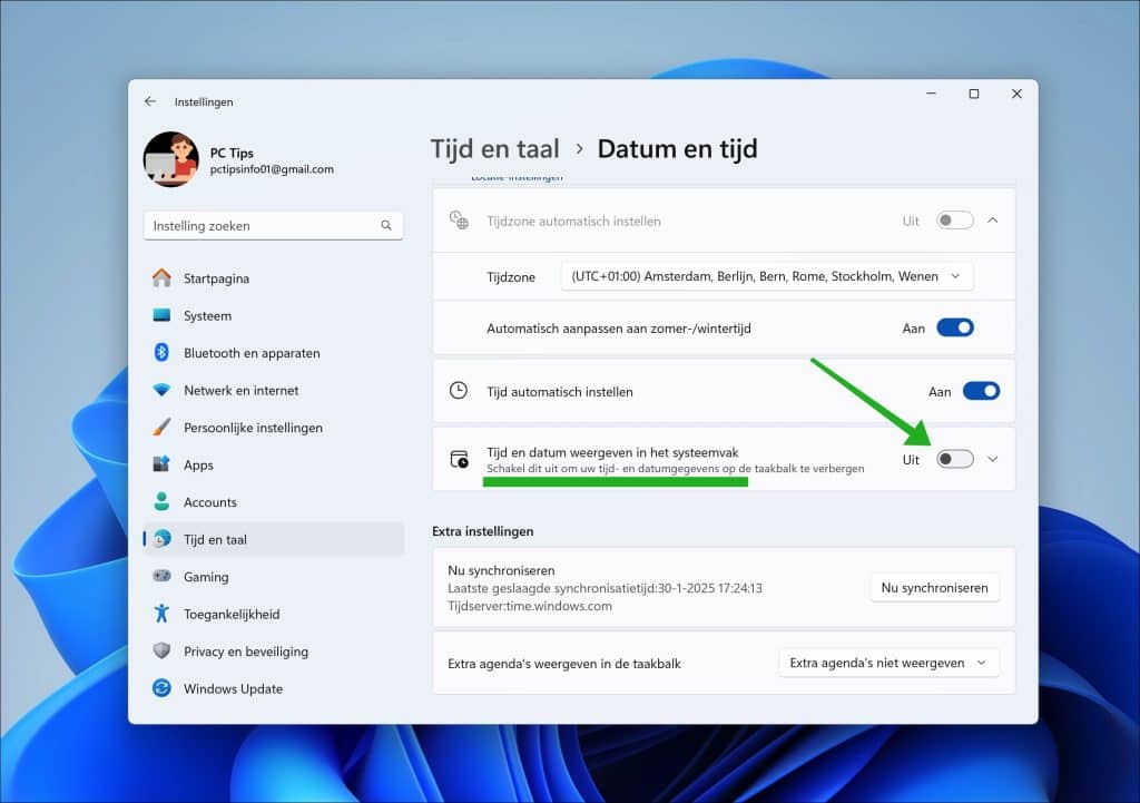 Tijd en datum weergeven of verbergen in systeemvak